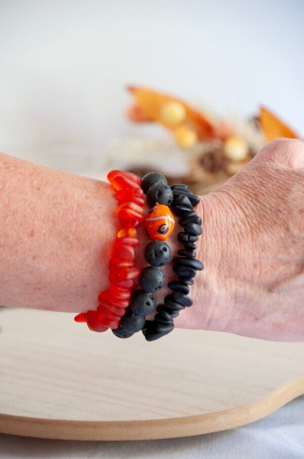 Natural Black Lava and Orange Bracelet by MK Designs