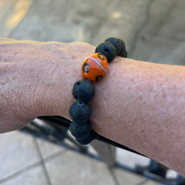 Natural Black Lava and Orange Bracelet by MK Designs