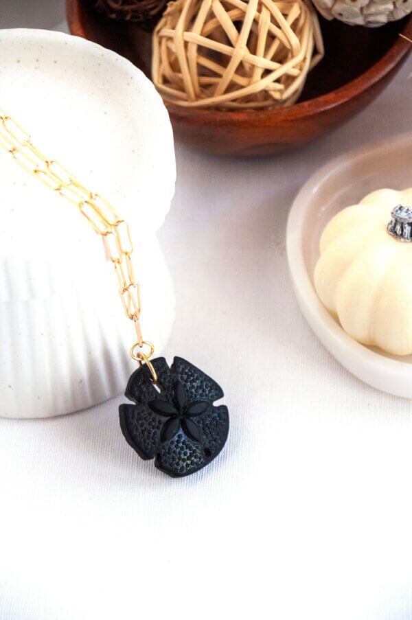 Black Sand Dollar Pendant Necklace by MK Designs